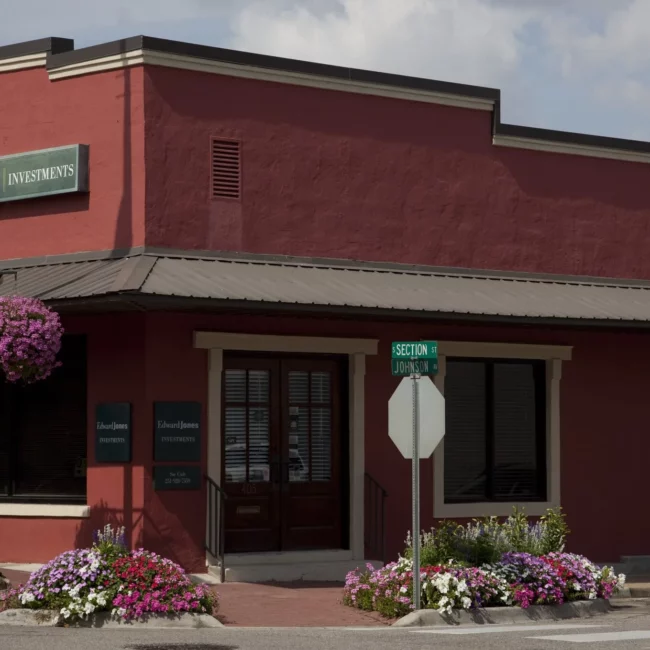 Downtown Fairhope storefront with hanging flower baskets